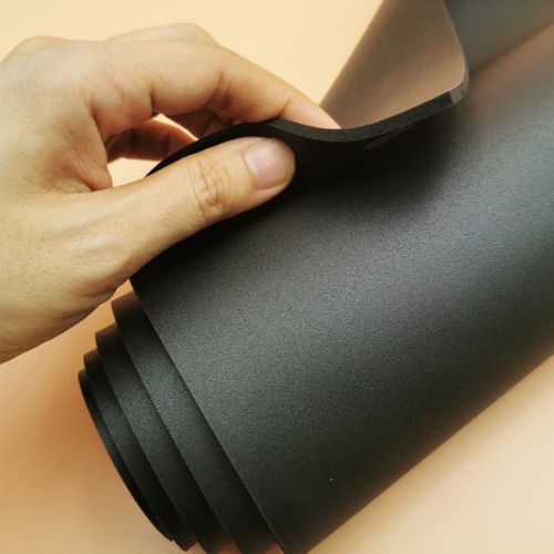 poron_gasket_material Hand holding a sheet of Poron gasket material.